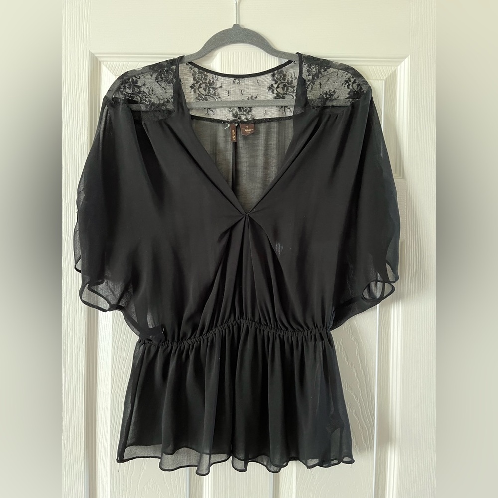Woman’s black blouse size small